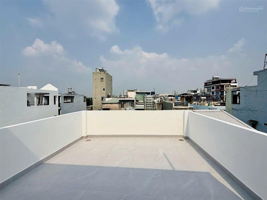 Nhà xây mới 5 tầng 60m2 hẻm xe hơi đường quang trung, gần emart 2