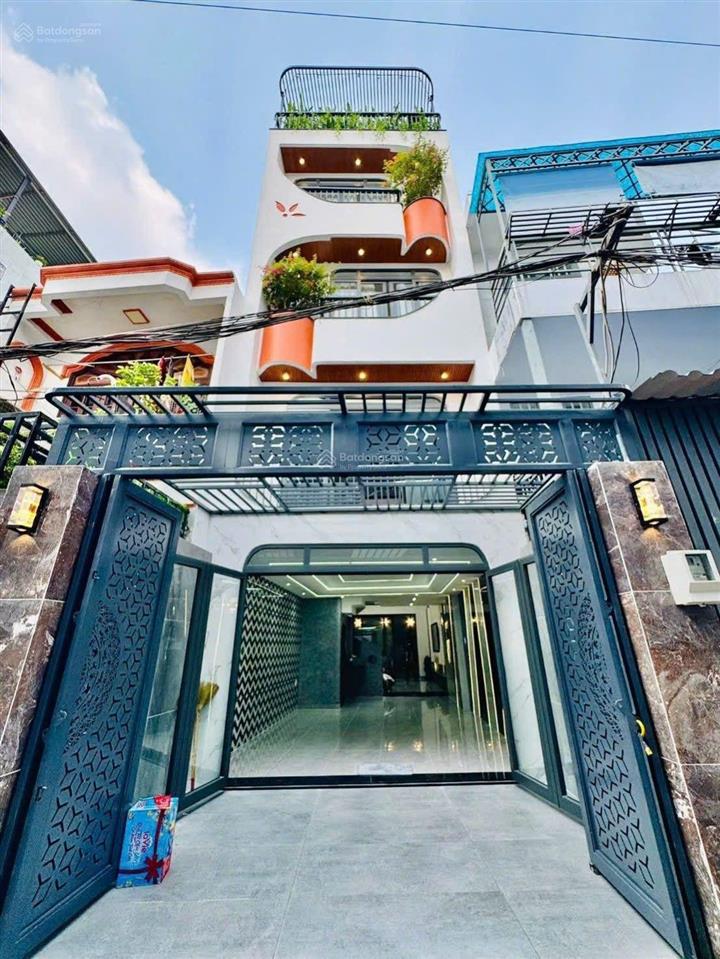 Nhà xây mới 5 tầng 60m2 hẻm xe hơi đường quang trung, gần emart 2