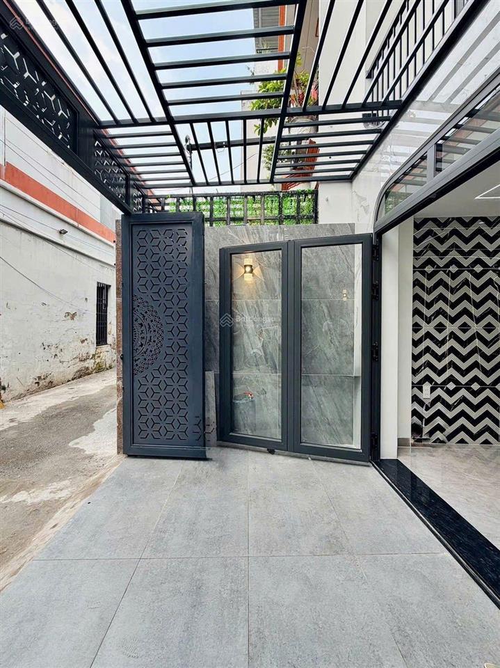 Nhà xây mới 5 tầng 60m2 hẻm xe hơi đường quang trung, gần emart 2