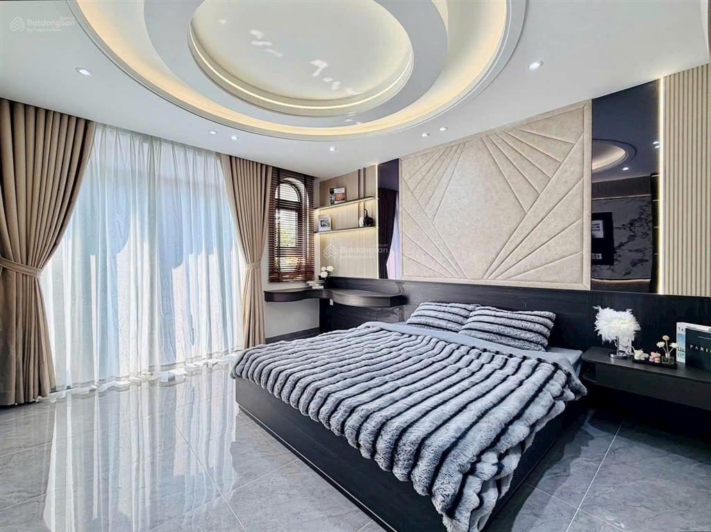 Nhà xây mới 5 tầng 60m2 hẻm xe hơi đường quang trung, gần emart 2