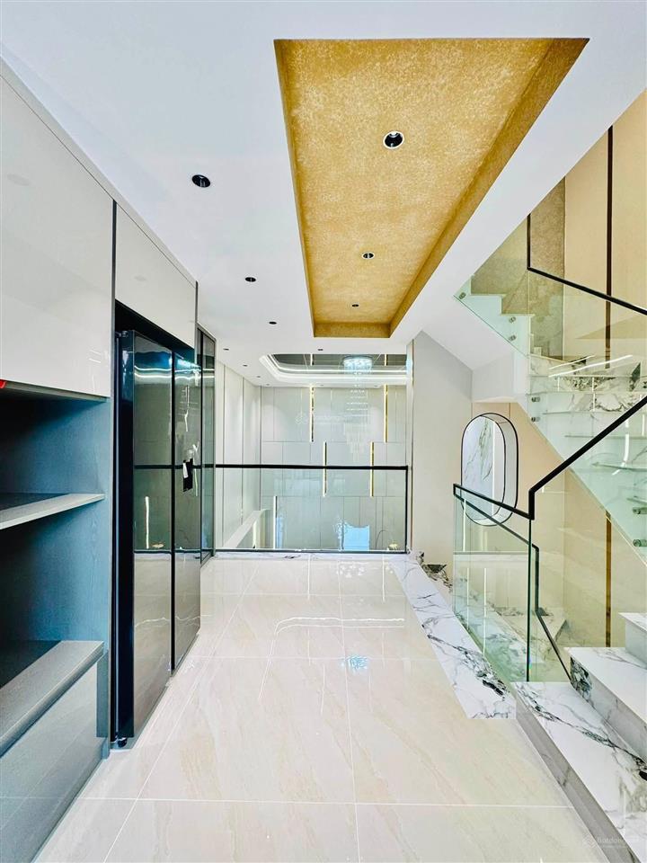 Nhà xây mới 5 tầng 52,7m2 hẻm xe hơi 5m sát mặt tiền lê đức thọ, ngay chợ an nhơn