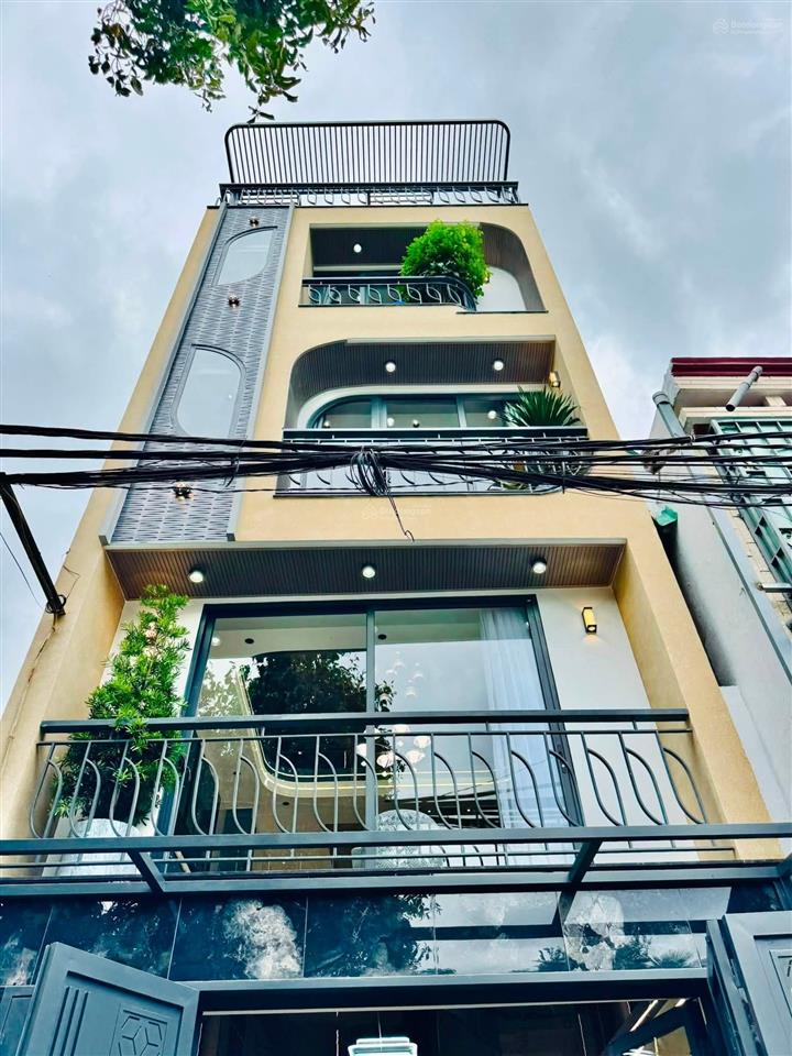 Nhà xây mới 5 tầng 52,7m2 hẻm xe hơi 5m sát mặt tiền lê đức thọ, ngay chợ an nhơn