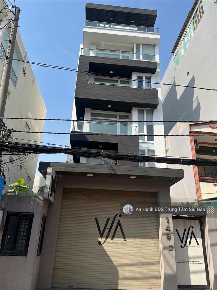 Hạ giá! bán toà nhà mặt tiền nguyễn cửu vân. dt 8.2 x 25, hầm  7 tầng cho thuê ổn định  giá 69 tỷ