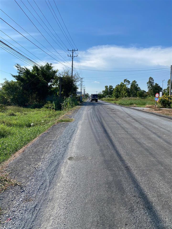 Cần bán 334 m2 đất(6x55) 100 m2 thổ cư + cln, mặt tiền nhựa tl877b, tân phú đông, tg.  0908 518 ***