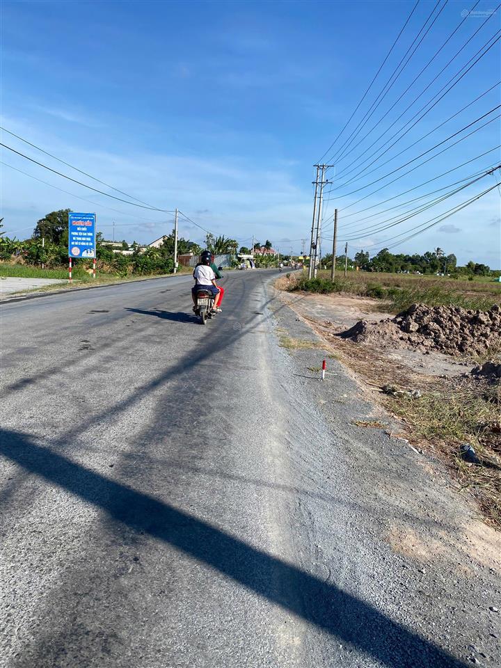 Cần bán 334 m2 đất(6x55) 100 m2 thổ cư + cln, mặt tiền nhựa tl877b, tân phú đông, tg.  0908 518 ***