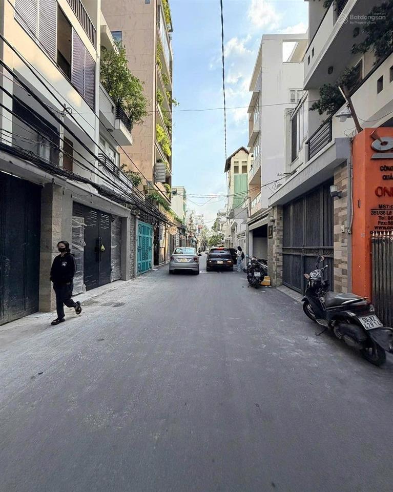 Bán toà nhà mới lê văn sỹ, phường 13, quận 3.
 diện tích 12x25m  công nhận 290m2 6tầng thang máy