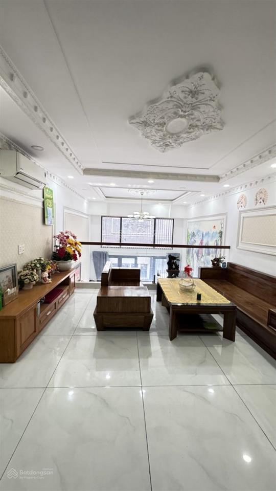 Nhà 240m2 sử dụng hẻm xe hơi lạc long quân  6 tầng  thang máy  4pn  an ninh dân trí