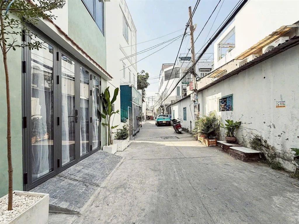 Quận 7 nhà phố sổ hồng riêng hẻm ô tô góc 2 mặt tiền thiết kế kiến trúc sư tỉ mỉ