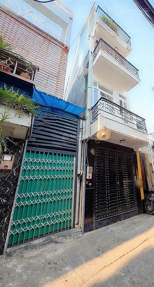 Quận 7  nhà 3 tầng  ngay kcx tân thuận  kế chợ bùi văn ba  p. tân thuận  hcm .