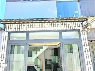 Quận 7  nhà 2 tầng mới hoàn thiện  hẻm xe hơi huỳnh tấn phát p. phú thuận  hcm .