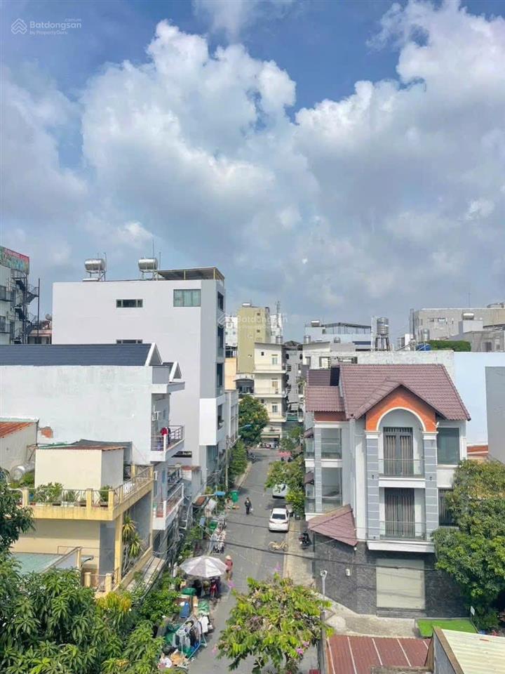 Bán nhà 4 tầng mt đường lý phục man  quận 7