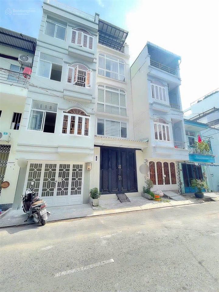 Bán nhà 4 tầng mt đường lý phục man  quận 7