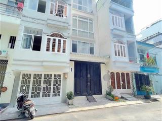 Bán nhà 4 tầng mt đường lý phục man  quận 7