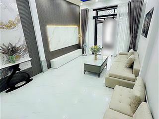 Quận 7  nhà phố gần chợ lý phục man nhà mới  dọn về ở ngay.