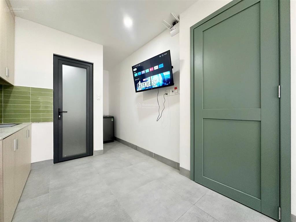 Căn hộ studio  full nt  ban công  máy giặt riêng  nhà mới 100%  hầm xe thang máy