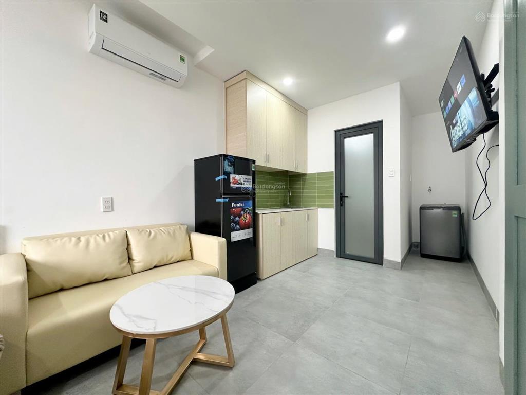 Căn hộ studio  full nt  ban công  máy giặt riêng  nhà mới 100%  hầm xe thang máy