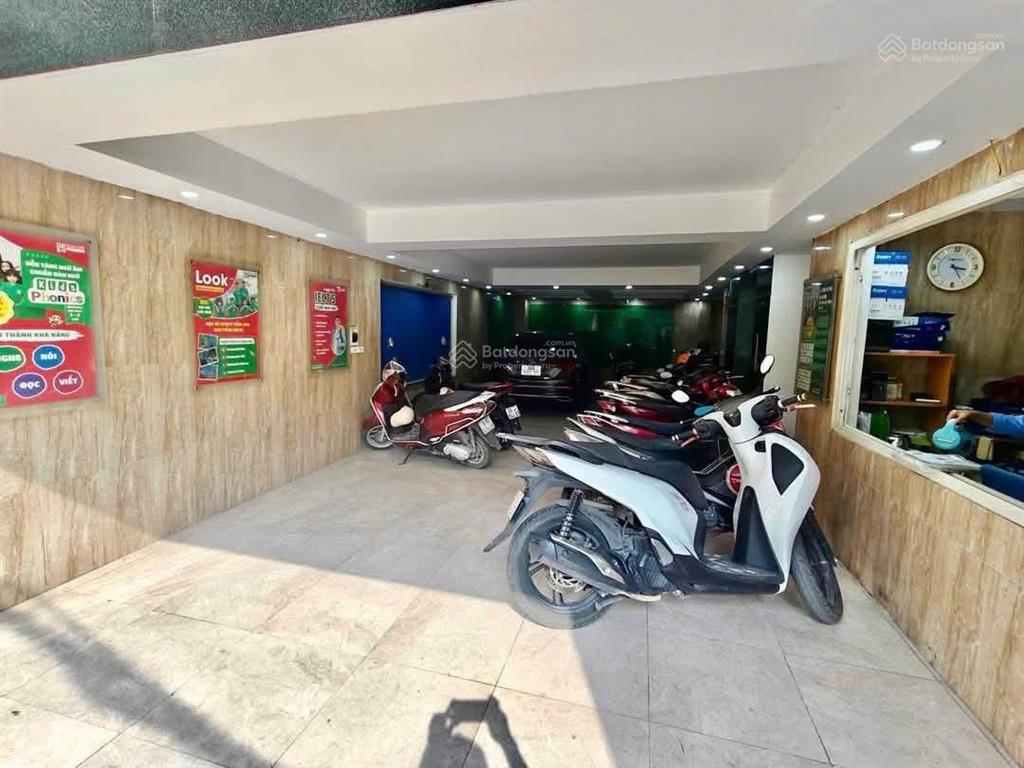 Bán tòa building mặt phố nguyễn phúc lai đống đa 112m 9 tầng mt 7,8m 50 tỷ