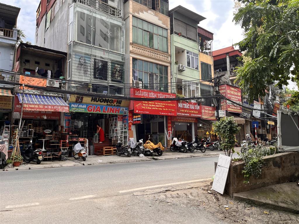 Bán nhà mặt phố đê la thành, lô góc 35m2* 6 tầng thang máy* mt 5m, gara ô tô