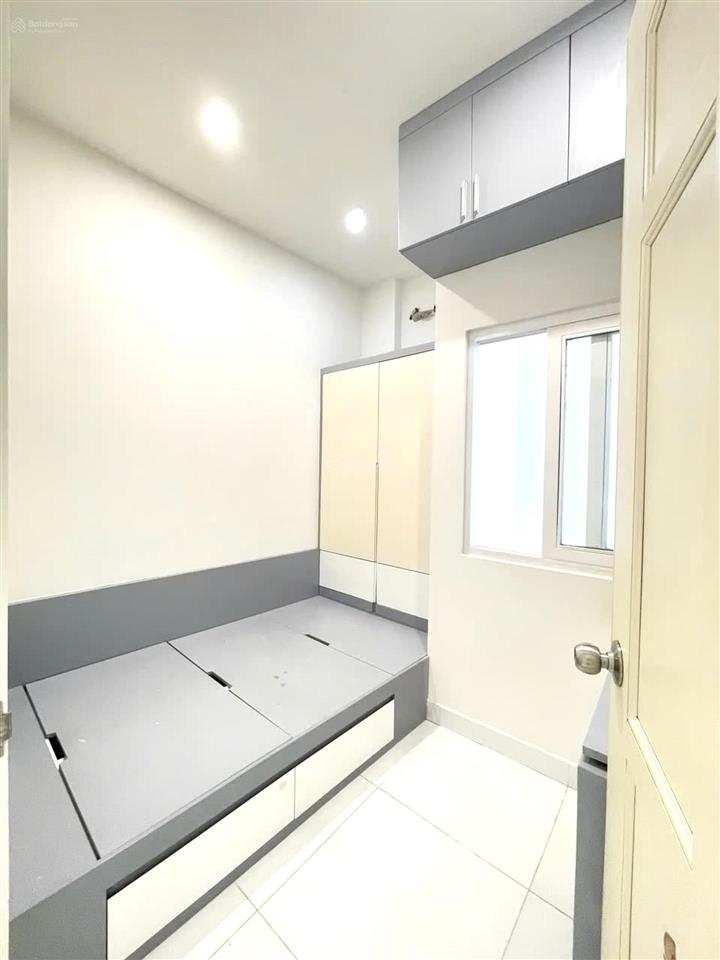 Nhà mới 2 tầng btct hẻm ô tô vườn điều, tân quy, quận 7, 4m x 8m, giá 4,65 tỷ