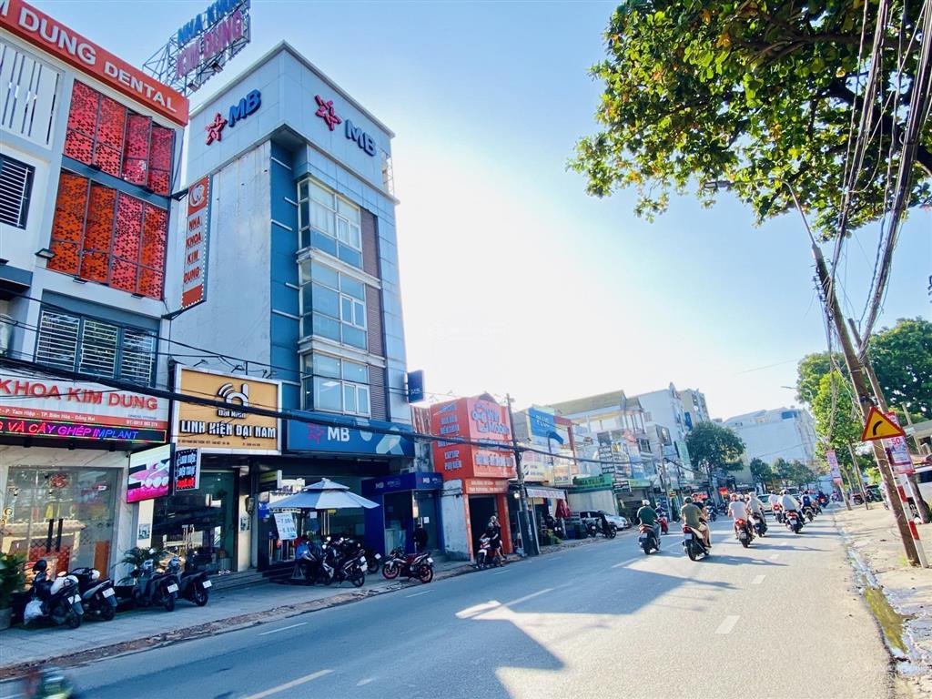 60 triệu/tháng  tòa nhà 1 hầm 4 lầu mặt tiền phạm văn thuận  p. tam hiệp