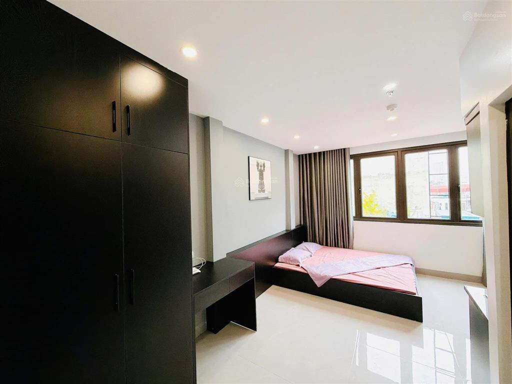 Giá rẻ đầu tư, tòa nhà vip, 65m2, 14 phòng, dòng tiền cao, nhà đẹp full nội thất, ngõ thông ô tô