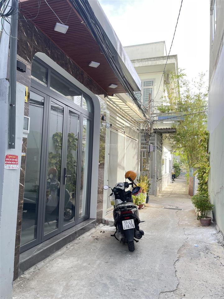 Bán nhà mới đẹp vào ở ngay htp q7  dt sàn 60m2 2pn có phòng dưới trệt giá chỉ hơn 100tr/m2
