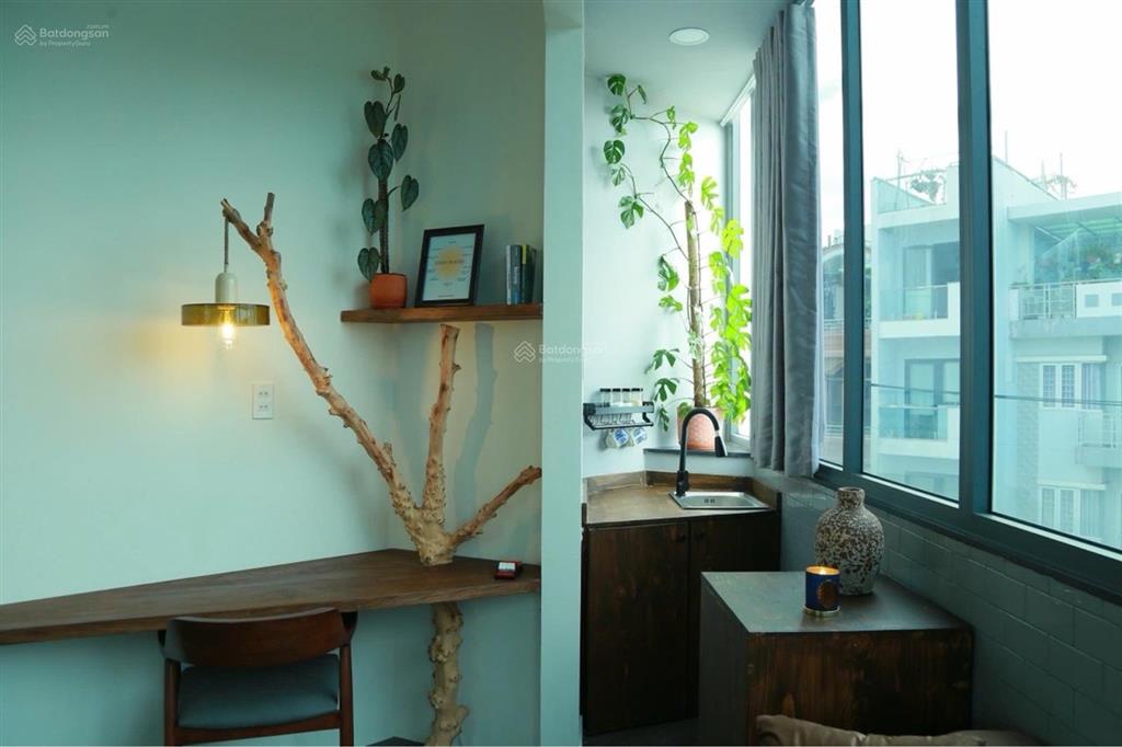 Chủ gấp bán lô góc 5 tầng 115m2 đặng thúc liêng p4 q8  ngang 7m có thang máy thu nhập 60tr/tháng