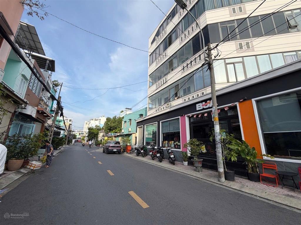 Chủ gấp bán lô góc 5 tầng 115m2 đặng thúc liêng p4 q8  ngang 7m có thang máy thu nhập 60tr/tháng