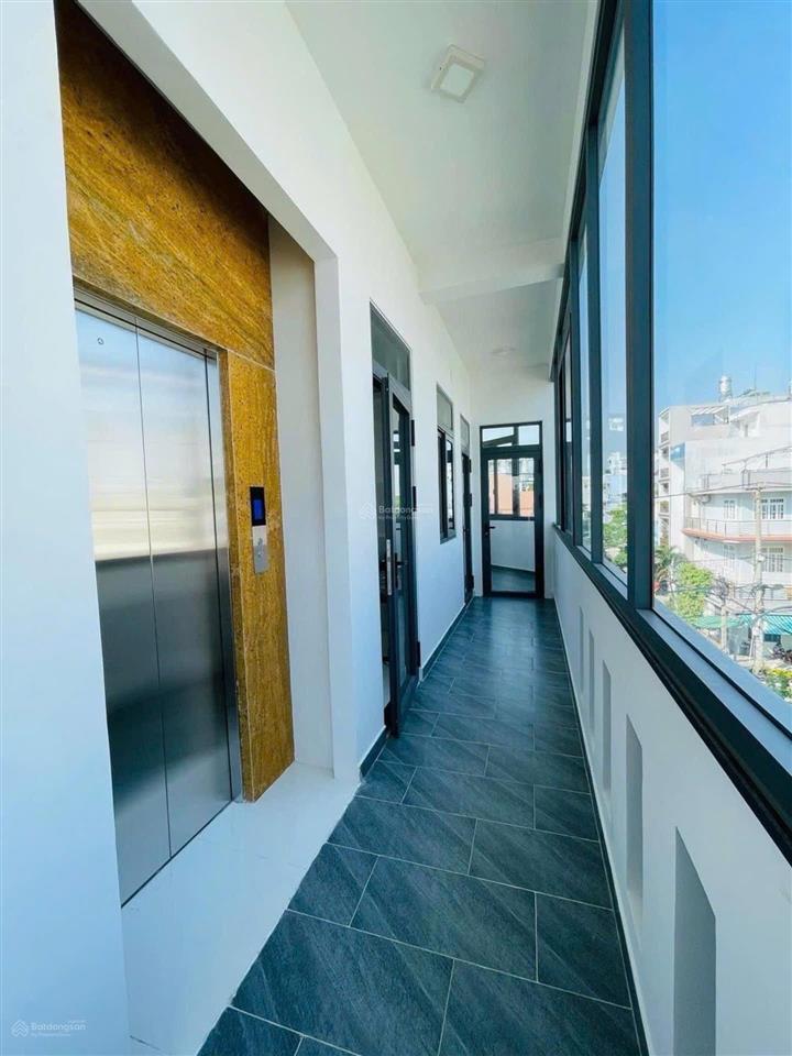 Chủ gấp bán lô góc 5 tầng 115m2 đặng thúc liêng p4 q8  ngang 7m có thang máy thu nhập 60tr/tháng
