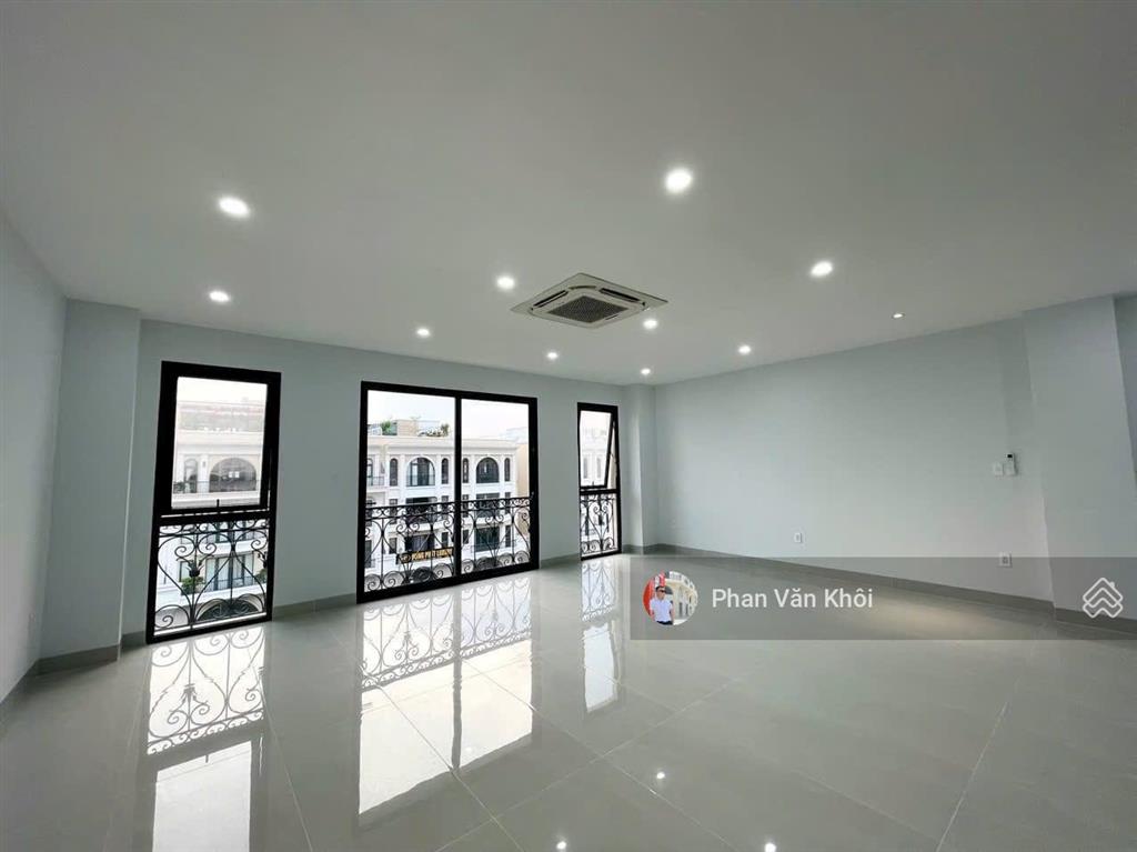 Cho thuê tòa nhà văn phòng dt 7x21m, nhà 1 hầm 5 lầu  800m2 sàn tại vạn phúc