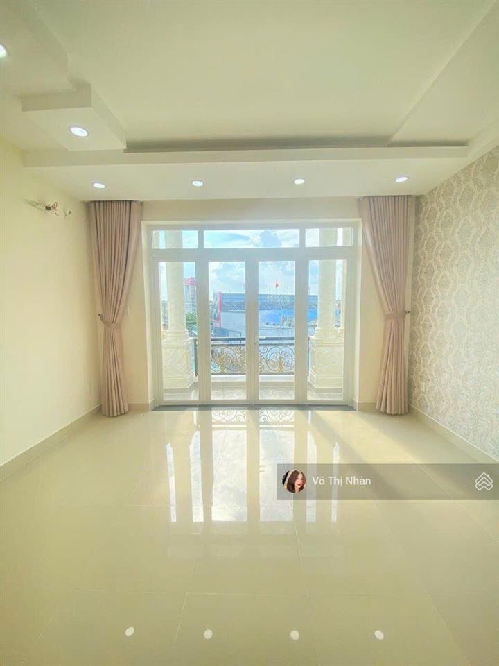 Nhà 4 tầng đón đầu quốc lộ 13  đối diện vạn phúc  diện tích 89m2 nở hậu  đường xe hơi tránh