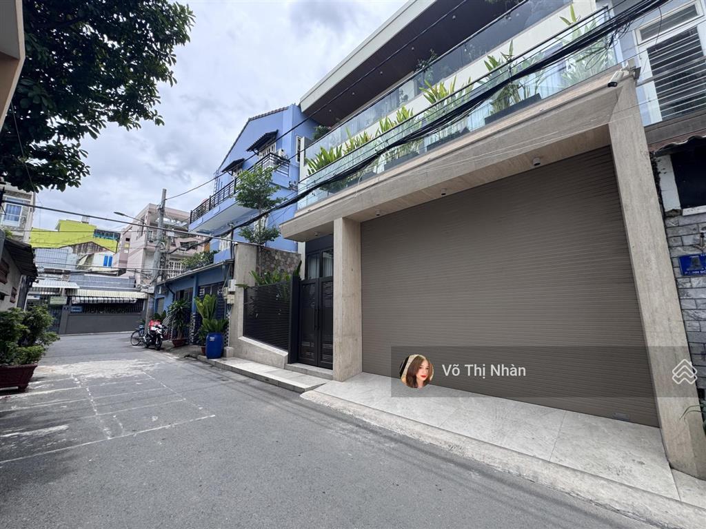 Chdv 5 tầng lầu có thang máy  thu nhập 50tr/tháng  đường xe hơi thông  giá 10.35 tỷ