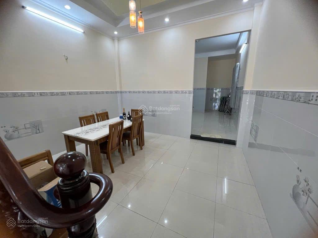 Bán nhà 2 tầng hxh gần cầu ông nhiêu p phú hữu quận 9  99m2 sổ hồng 5,6 tỷ 0764 994 ***