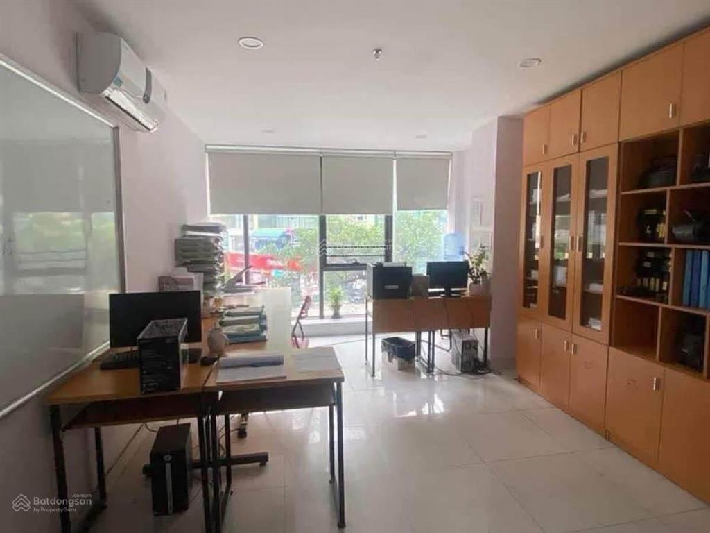 Mp trần đăng ninh  9 tầng 1 hầm  mặt tiền 7m  vỉa hè  kdvp.