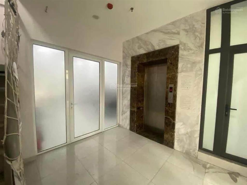 Mp trần đăng ninh  9 tầng 1 hầm  mặt tiền 7m  vỉa hè  kdvp.
