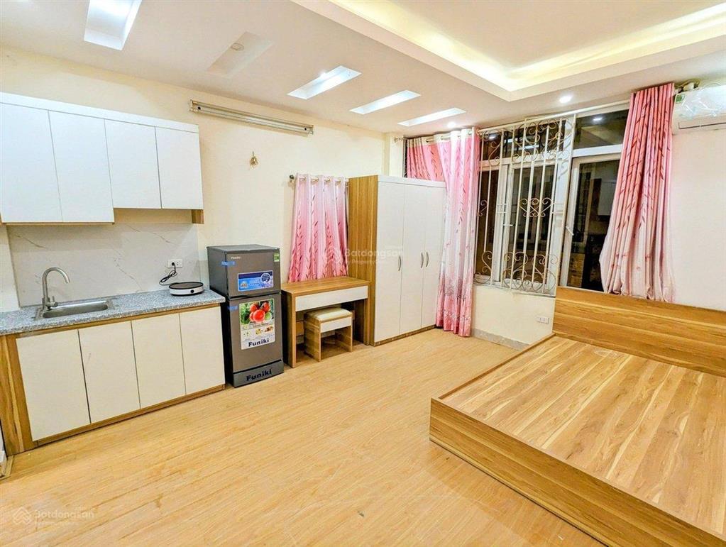 Chủ nhờ bán tòa chung cu mini bồ đề lb 52m 6 tầng thang máy 10 phòng cho thuê 40tr/th ngõ ô tô