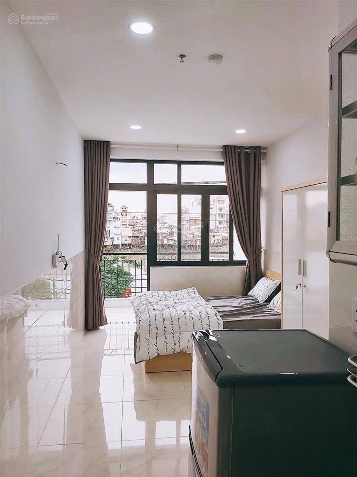 Căn hộ ban công view sông gần cầu kênh tẻ quận 4  full nội thất