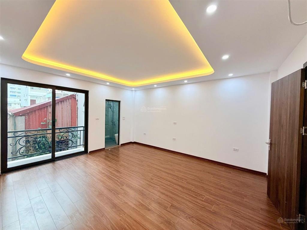 Nhà mới thang máy, ô tô qua nhà, trung tâm phố trương định, giá tốt