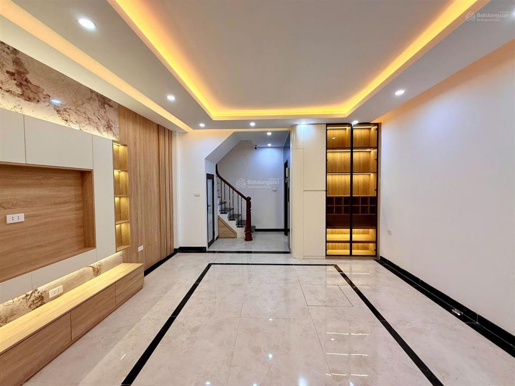 Nhà mới thang máy, ô tô qua nhà, trung tâm phố trương định, giá tốt
