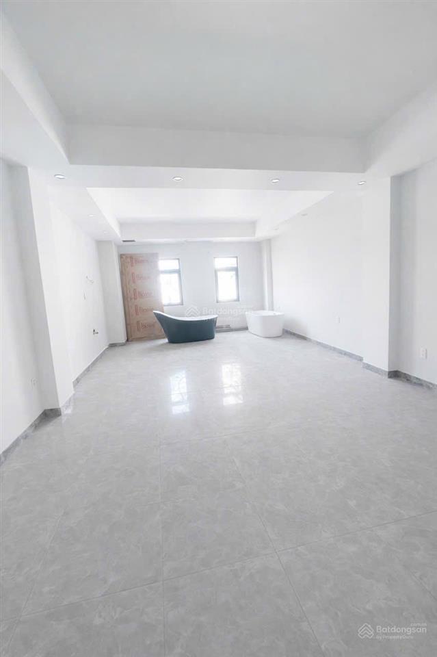 Tòa nhà 6 lầu có thang máy mặt tiền lê đức thọ, gò vấp