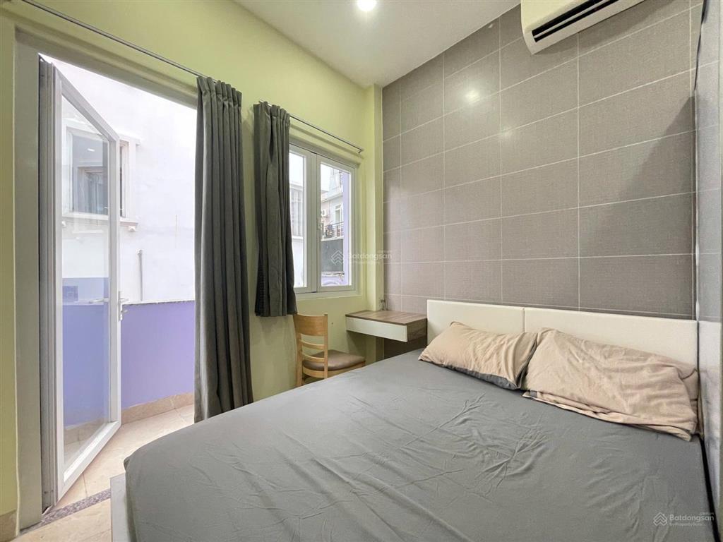 Căn hộ ban công full nt  hẻm ô tô ngay cầu lê văn sỹ, bờ kè, vx dân chủ, đh ueh, hsu, bku, huflit