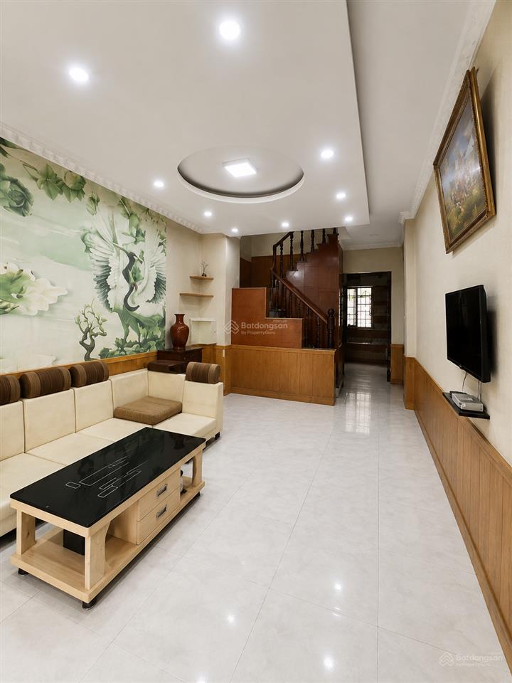 Bán nhà nơ trang long, 3 tầng, 64m2, ngang 4x16m, 2 mặt hẻm trước sau, ô tô đỗ trước cửa.