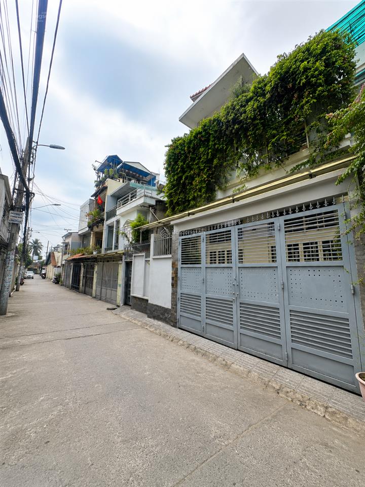 Bán nhà nơ trang long, 3 tầng, 64m2, ngang 4x16m, 2 mặt hẻm trước sau, ô tô đỗ trước cửa.