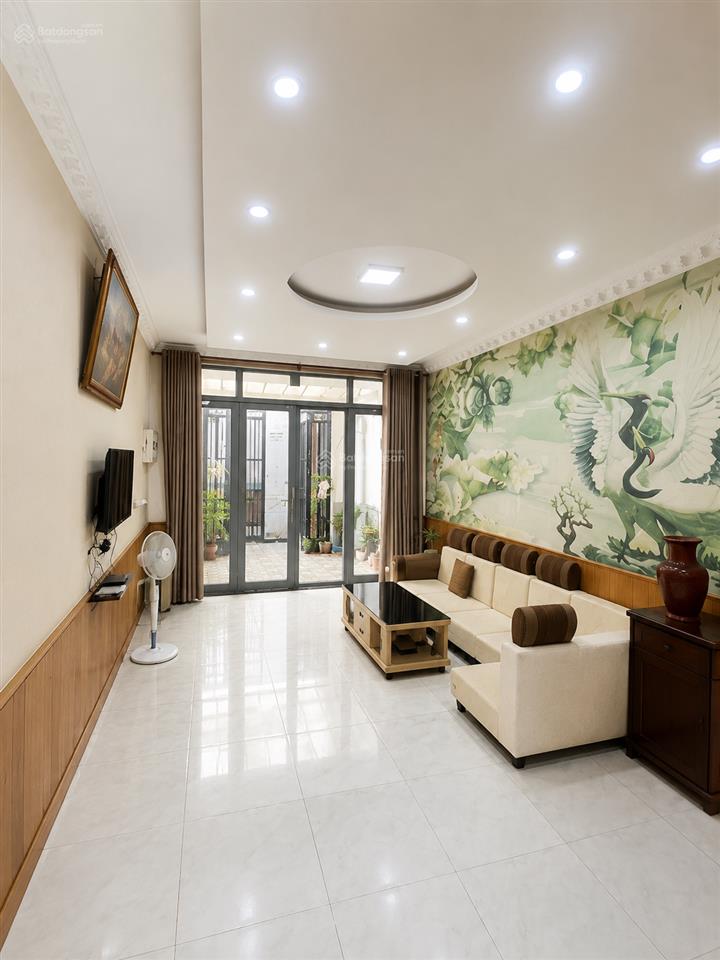 Bán nhà nơ trang long, 3 tầng, 64m2, ngang 4x16m, 2 mặt hẻm trước sau, ô tô đỗ trước cửa.