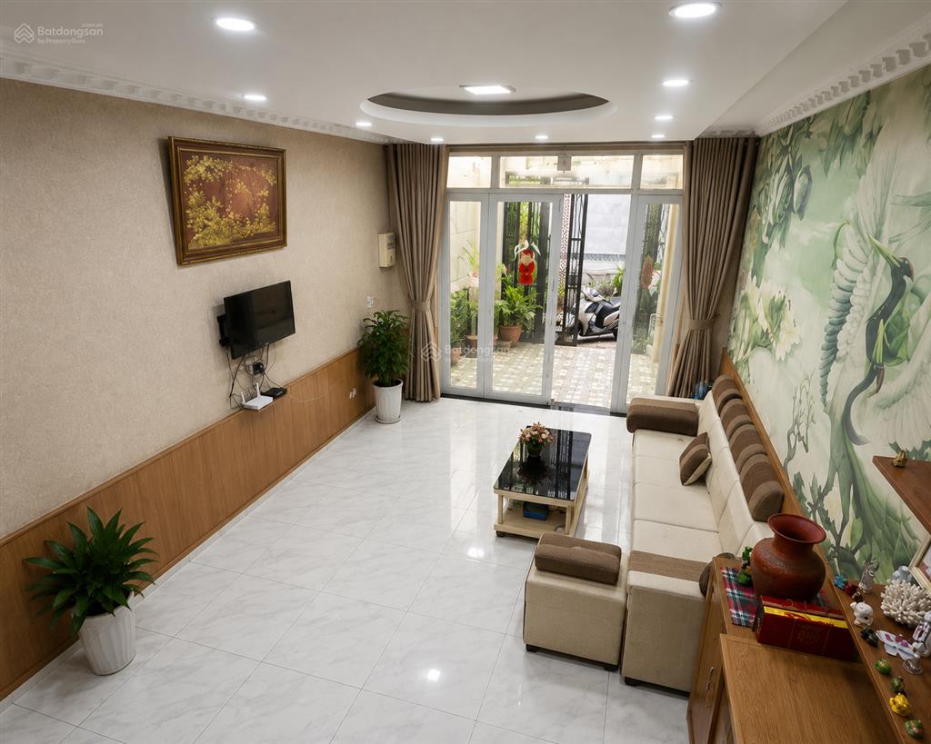 Bán nhà nơ trang long, 3 tầng, 64m2, ngang 4x16m, 2 mặt hẻm trước sau, ô tô đỗ trước cửa.