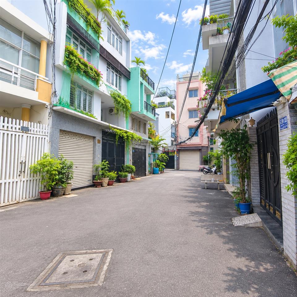 Bán nhà nơ trang long, 4 tầng, 7 phòng cho thuê khoán 21tr/tháng, hẻm ô tô