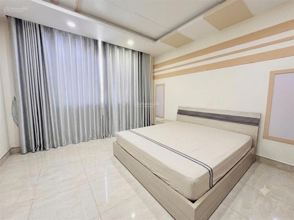 Bán nhà 5 tầng, nguyễn văn đậu, 2 mặt tiền trước sau, dtsd 211m2, 5 phòng ngủ thoáng ô tô tận nhà