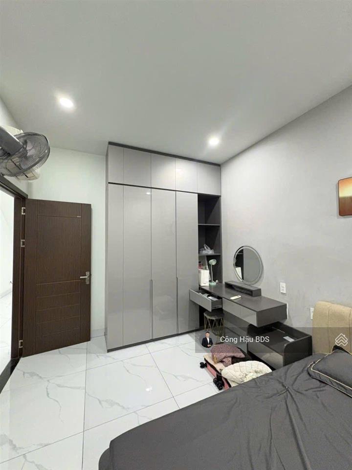 Nhà 2 tầng mới 90%. thiết kế hiện đại. p. đông hoà. dt 100m2 (5x20m). gồm 4pn 4wc. giá 7.3 tỷ tl