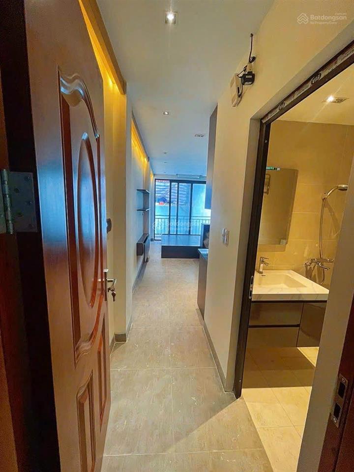 Bán nhà riêng xây mới tinh 38m2, 8 tầng thang máy, cách mặt phố lê trọng tấn 20m, ngõ thông tứ phía