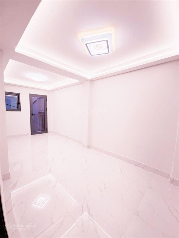 Vòng xoay cây gõ kế chợ bình tiên nhà đẹp 4 tâng btct với 5pn hẻm